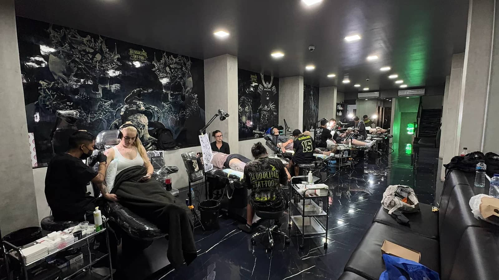 Best tattoo studio floor in Bali with artists working across multiple stations