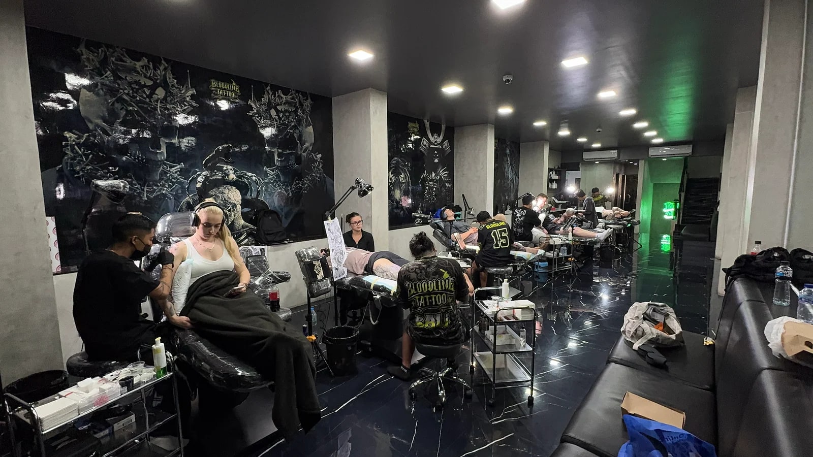 Best tattoo studio floor in Bali with artists working across multiple stations