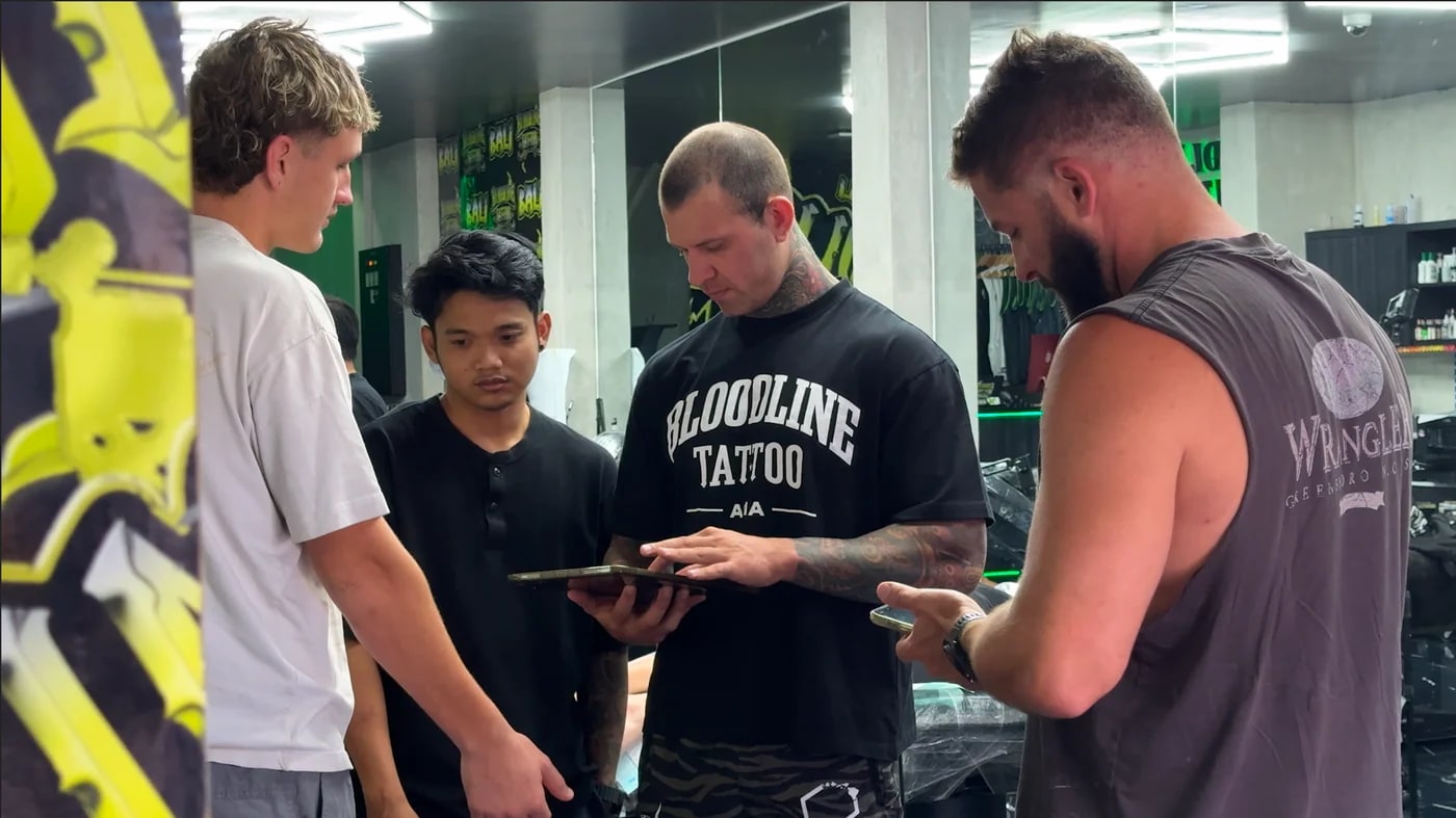 Premium Bali tattoo studio interior with clean workstation and consultation flow